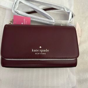Brand New still in the packaging Kate Spade burgundy small flap crossbody.